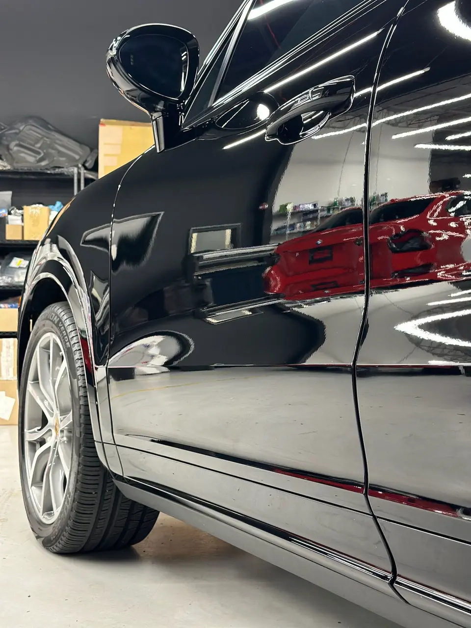 Corrected black paint on a Porsche Cayenne door