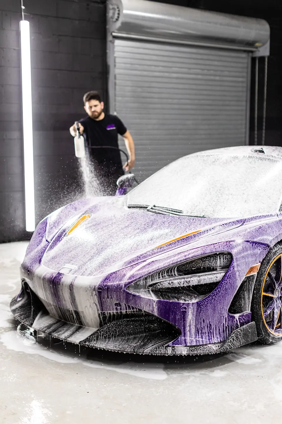 Foam pre-wash on a wrapped McLaren