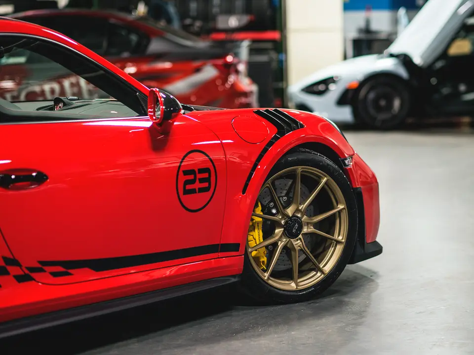 Red Porsche GT3 RS with custom livery