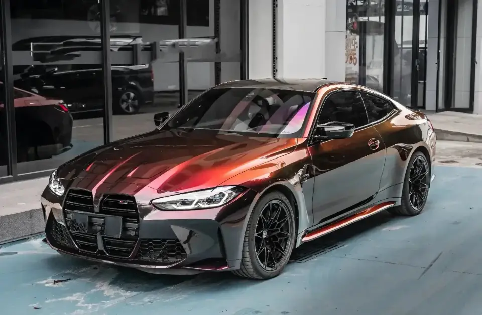 BMW M4 in a black-to-red color shift wrap