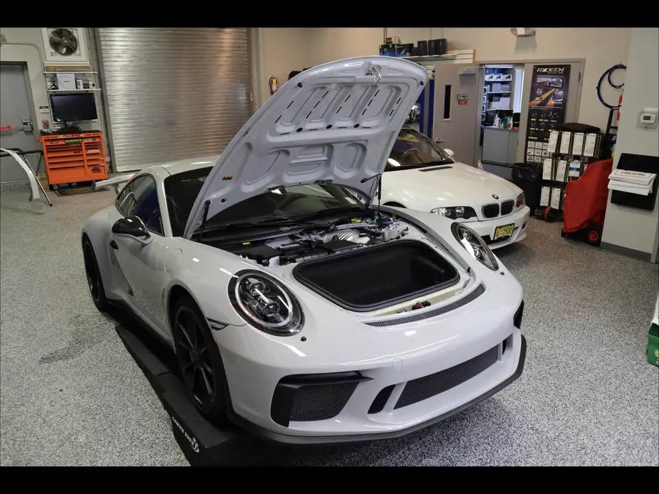 White Porsche 911 in the Paramus bay