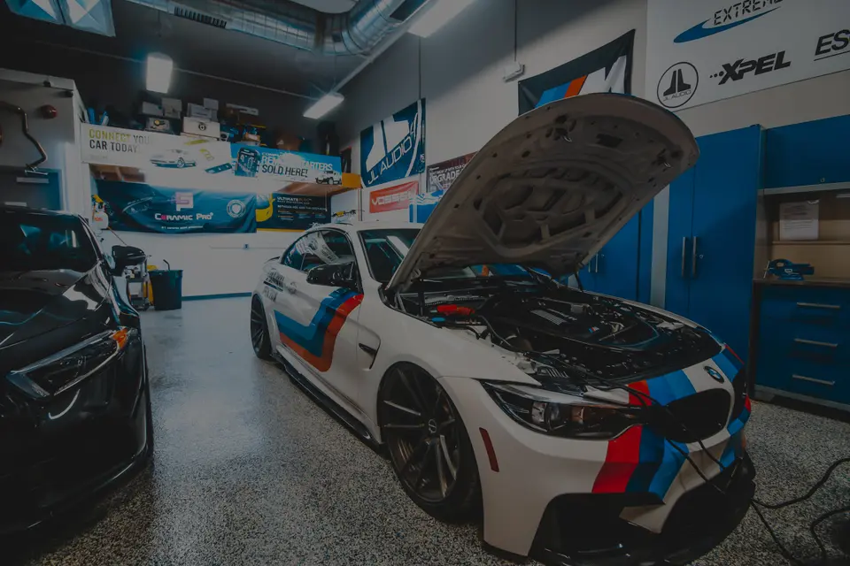 BMW M4 with livery in the Paramus bay