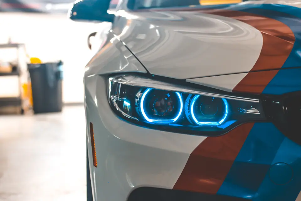 BMW M4 with blue halo headlight lighting