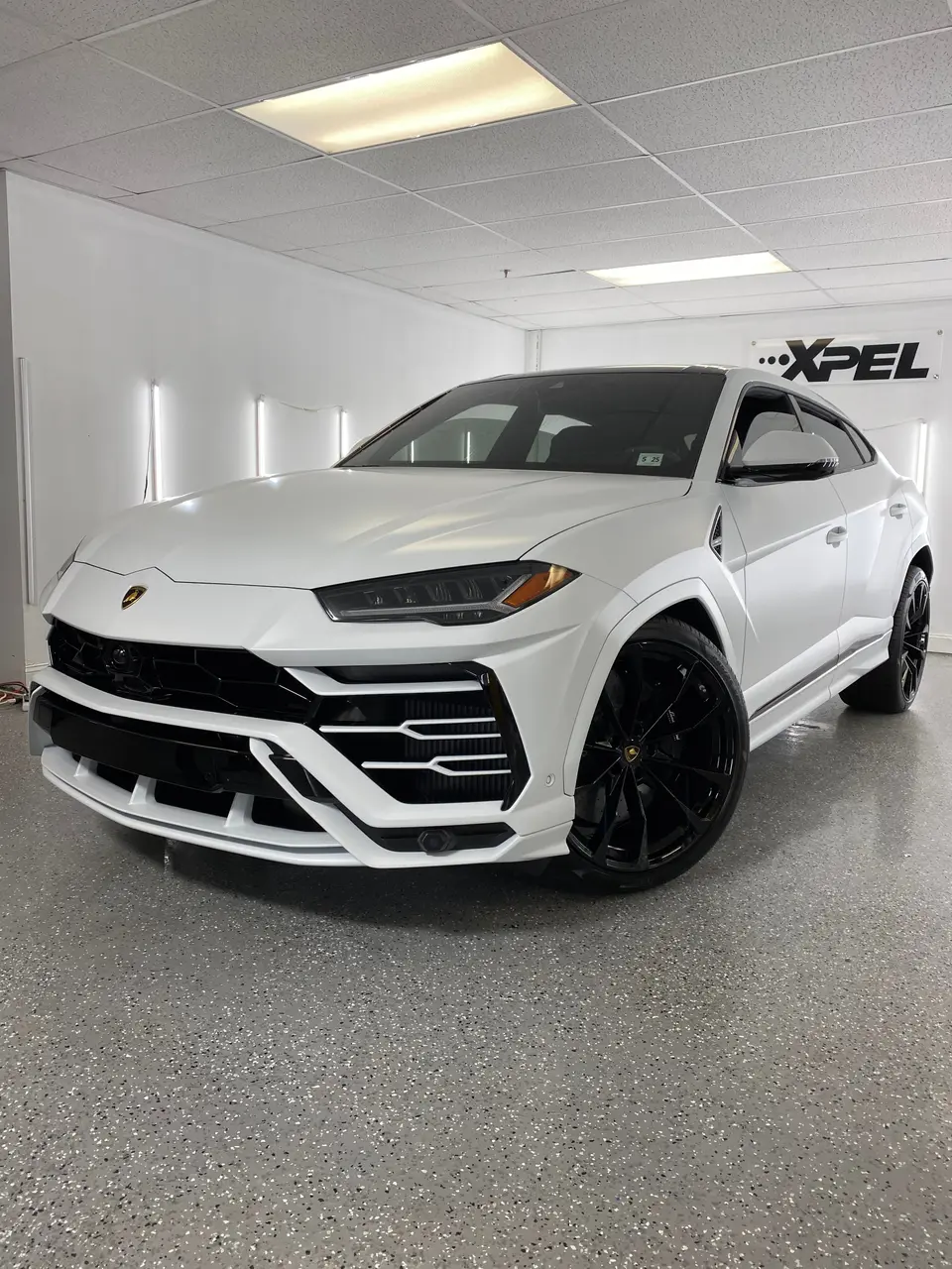 White Lamborghini Urus in the Paramus film studio