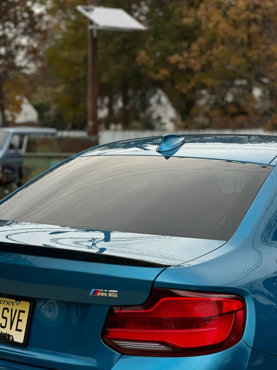 Tinted rear glass on a BMW M2