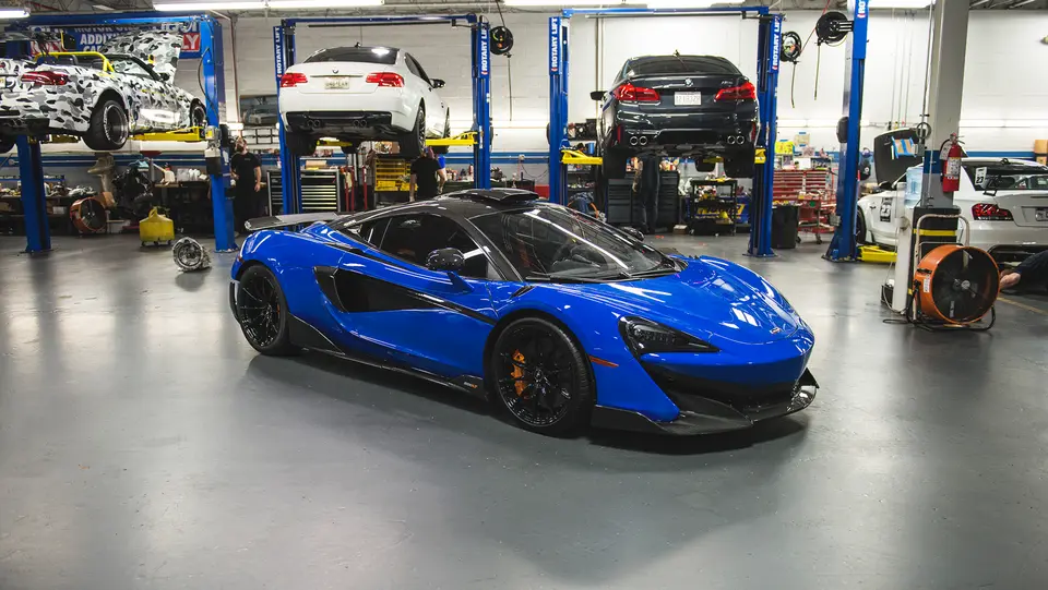 Blue McLaren 600LT in the shop