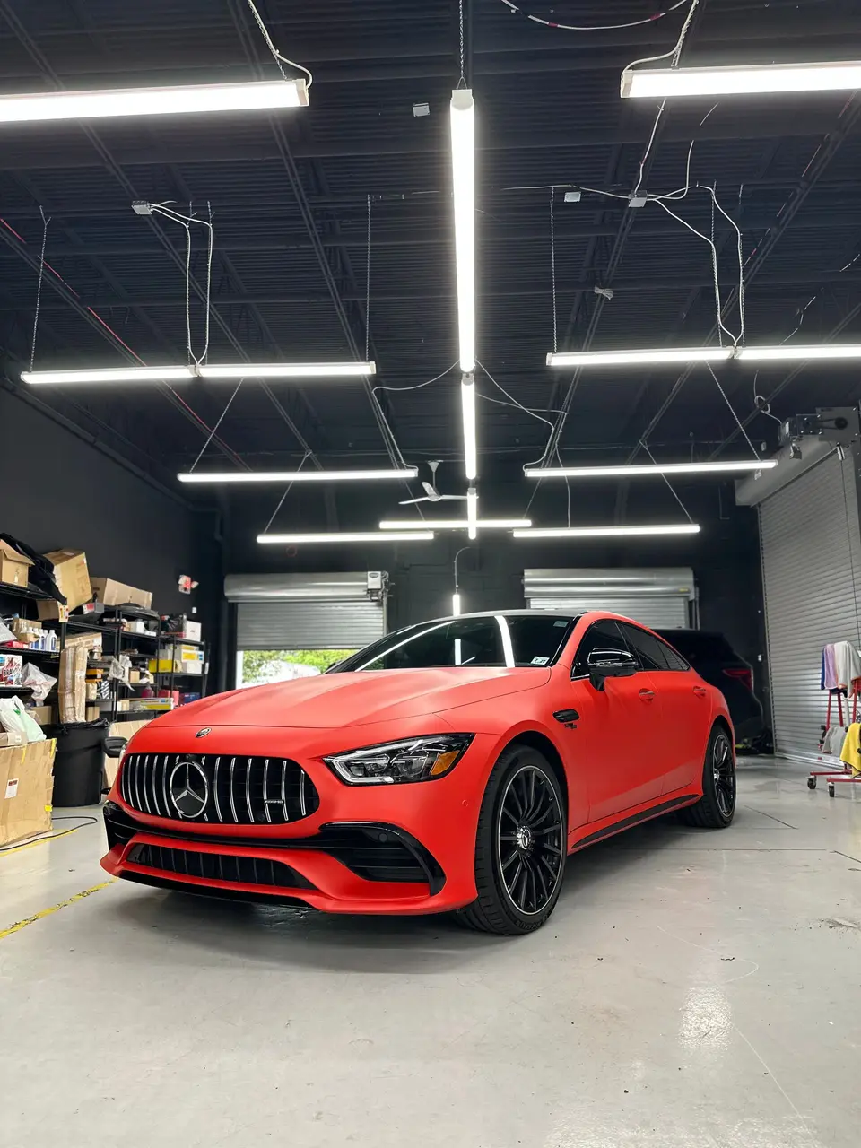 Mercedes-AMG GT53 in a full orange wrap