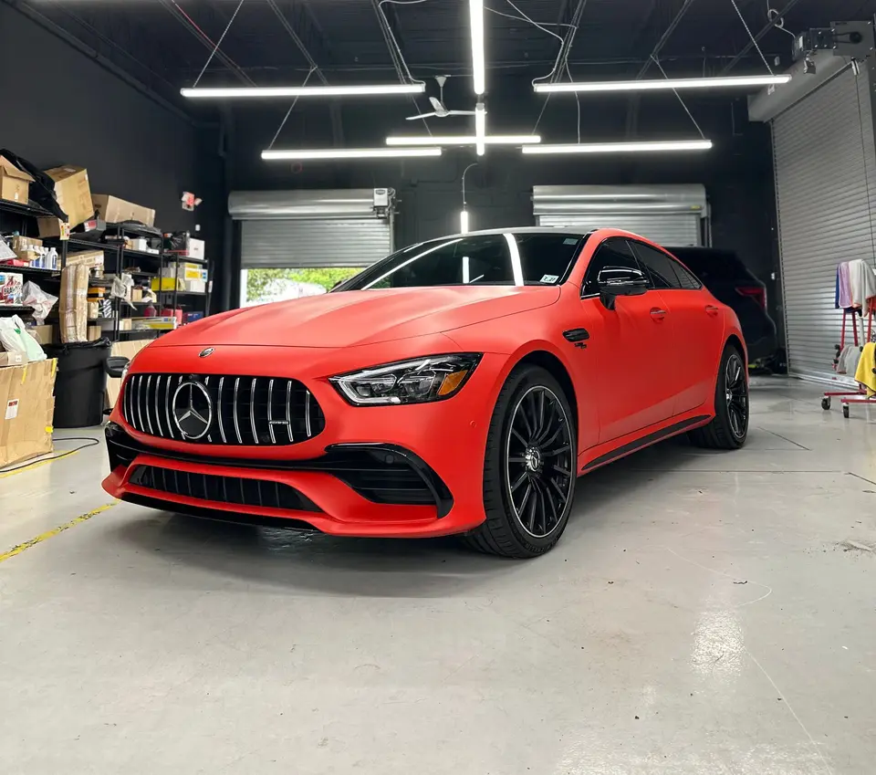 Orange satin wrap on a Mercedes-AMG