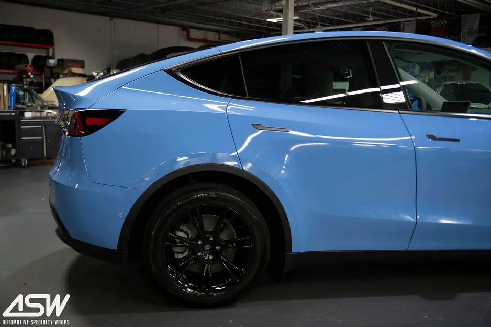 Tesla Model Y in a gloss blue wrap